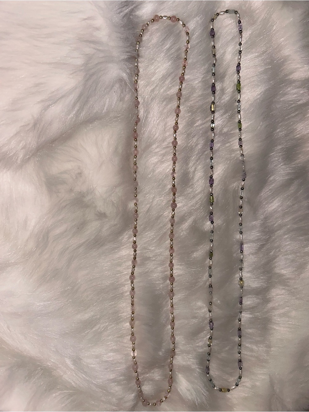 Two pearl gemstone necklaces different colors and stones